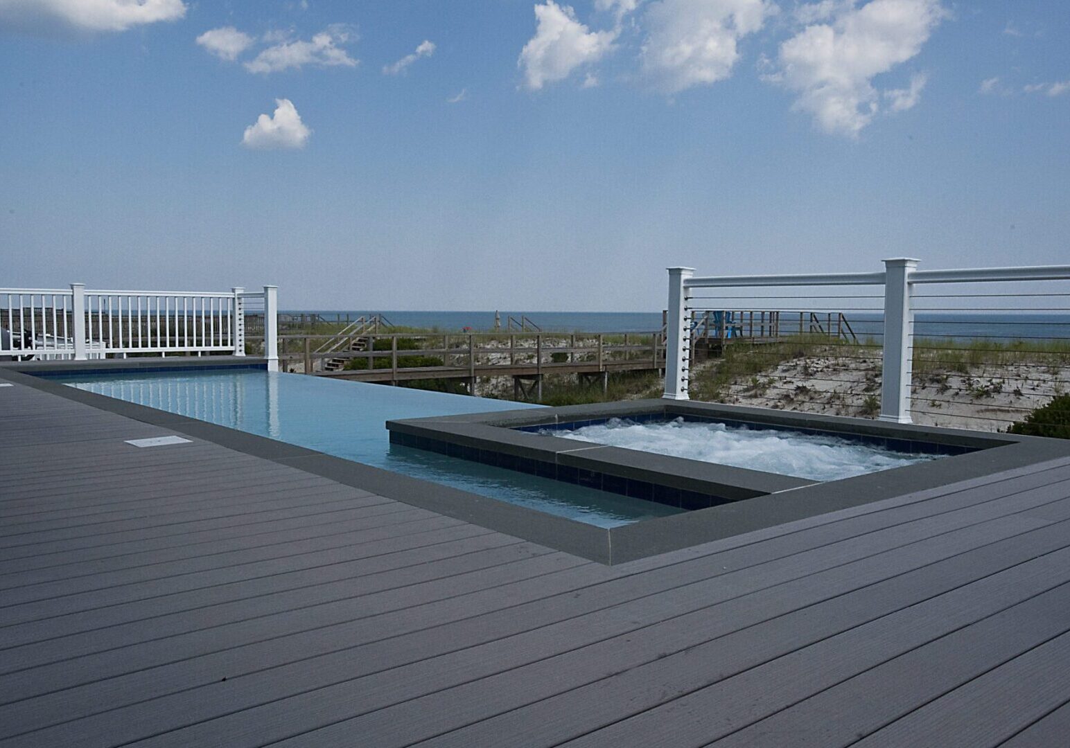 Modern deck with pool and ocean view