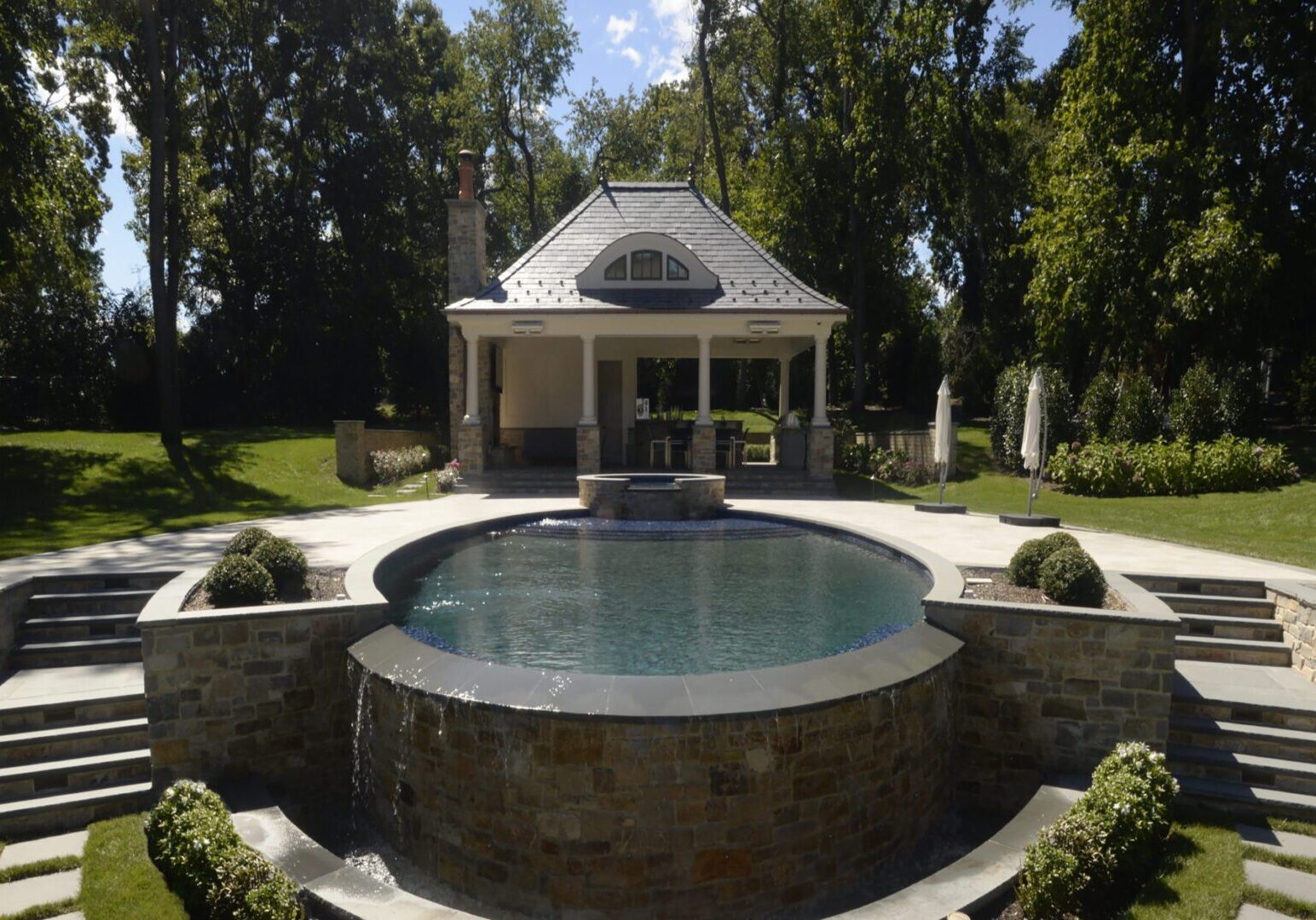 Circular pool and garden pavilion