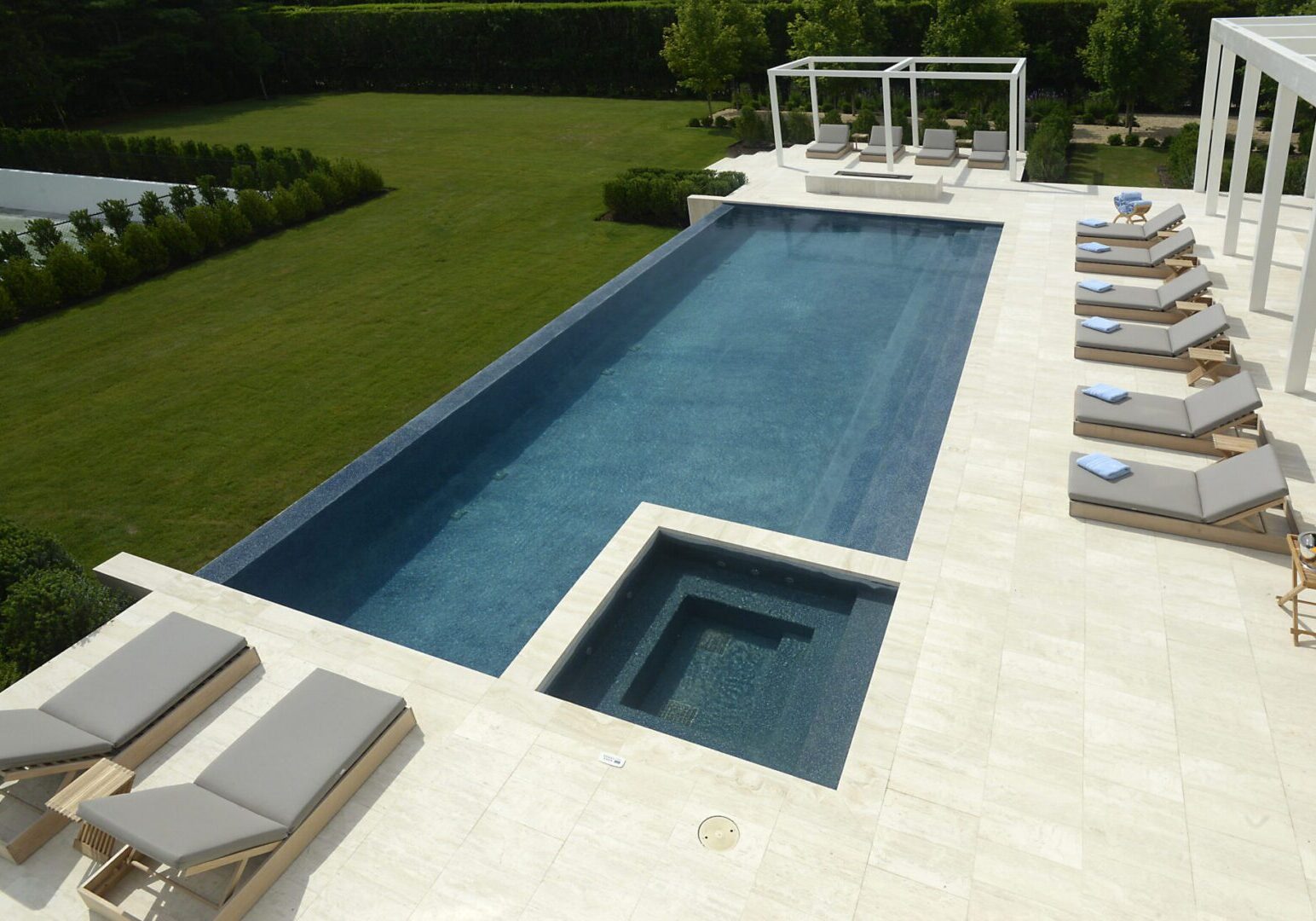 Elegant poolside with greenery