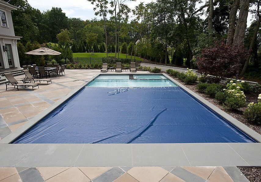 Patio with lounge chairs by pool