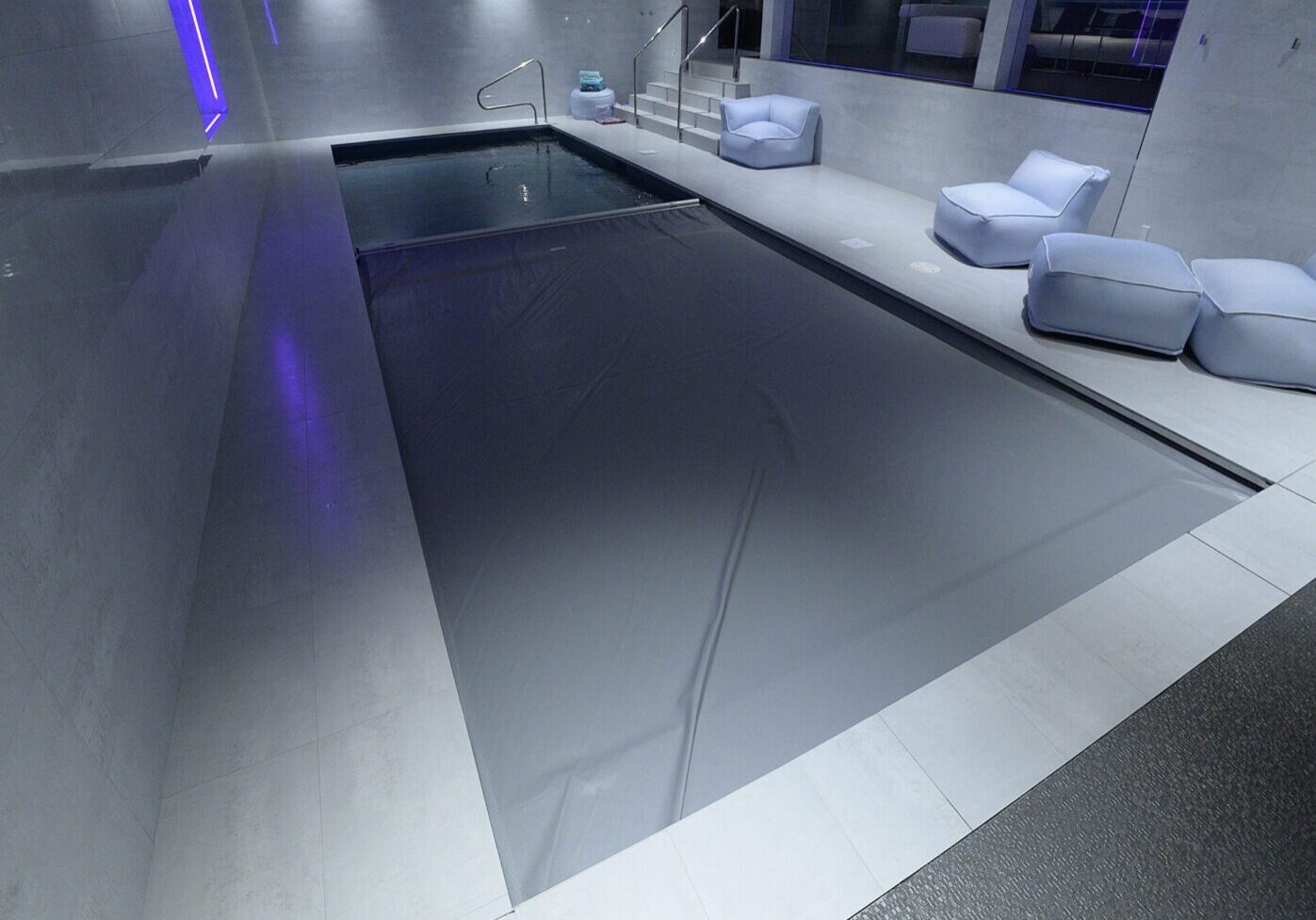 Luxurious indoor pool area at night